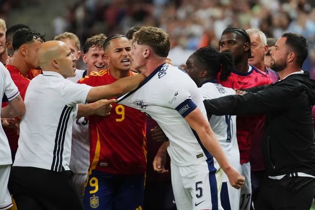 Spain's and England's players push each others after a quarter final soccer match between Spain and England at the European U-21 Championship at the Anton Malatinsky Stadium, in Trnava, Slovakia, Saturday, June 21, 2025. (AP Photo/Petr David Josek)