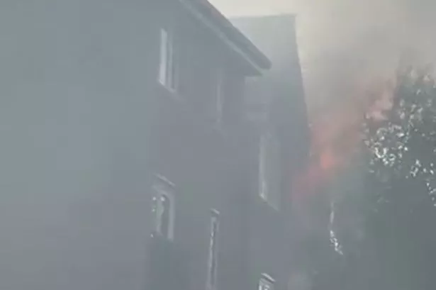 The moment a fire consumed part of block of flats on Marsh House Lane in Warrington