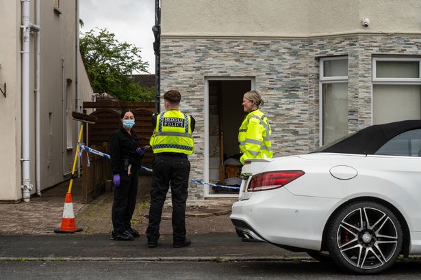 Police at the scene of an incident at a property in Lliswerry Road, Newport