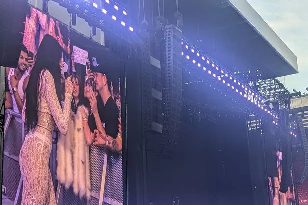Dua Lipa stopped to talk to fans on the barrier at her second Anfield show