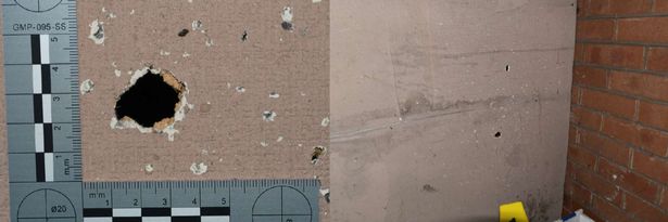 Bullet holes following the shooting