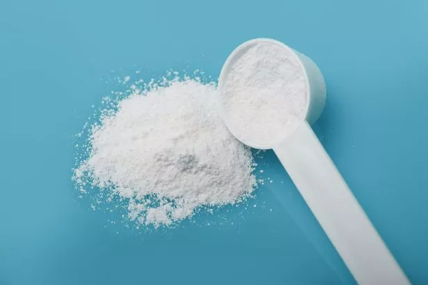 A scoop of powder creatine 