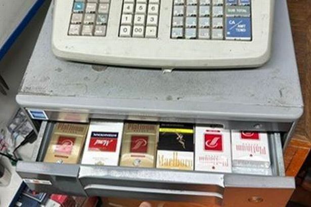 The illegal cigarettes were hidden in the shop's till