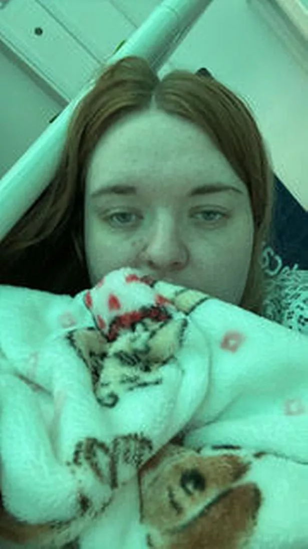 Tyanne in bed looking unwell