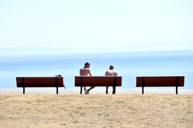 People enjoy the view at Barry Island