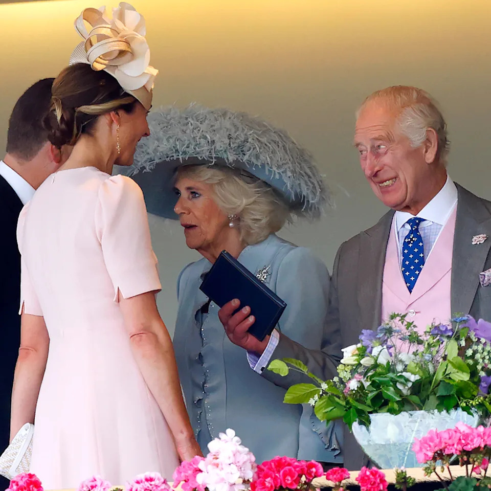  King Charles laughing talking to Harriet Sperling and Peter Phillips. 