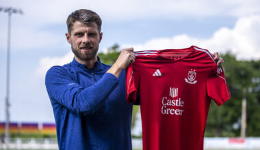 Jason Oswell holds up a Connah