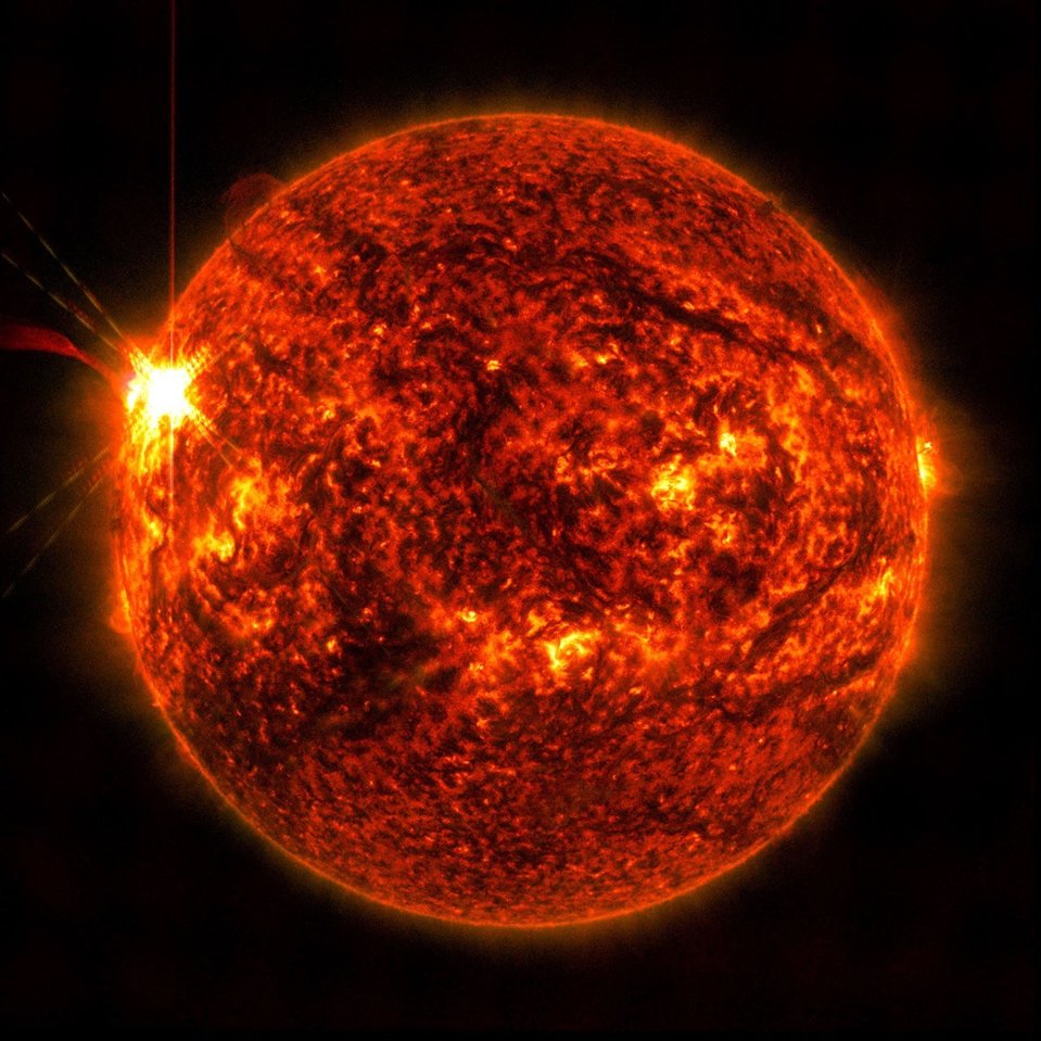 Image of the sun with a solar flare.