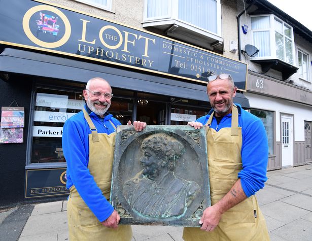 James Loft (left), and son John from The Loft Upholstery, Crosby, with the bronze plaque of Mary Poulsom