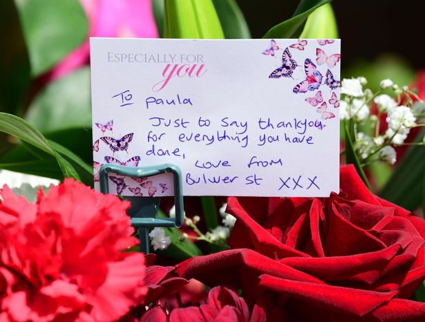 Flowers presented to Paula Prescott from the Forshaw Group, as a thank-you from residents of Bulwer Street, for all her help after the flooding.