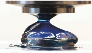 Solid-phase properties reveal when yield stress fluids start to flow