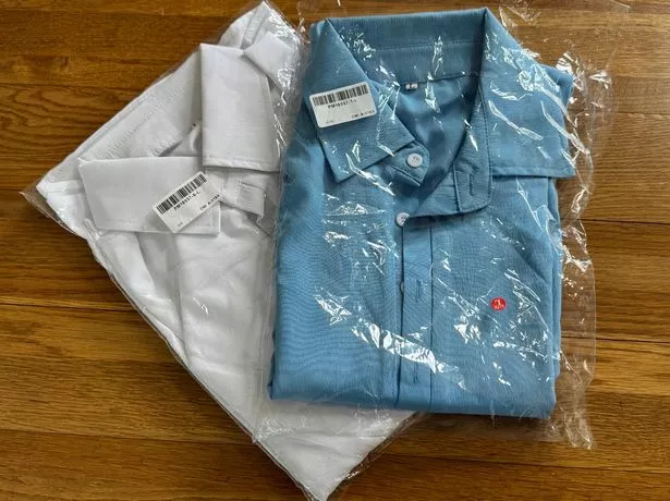 The blue and white shirts as they were delivered