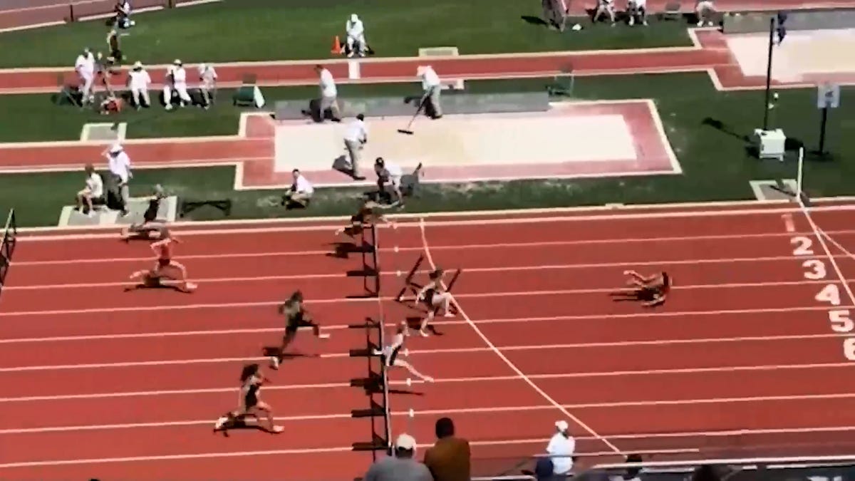 Video shows Oregon track star somersaulting over finish line