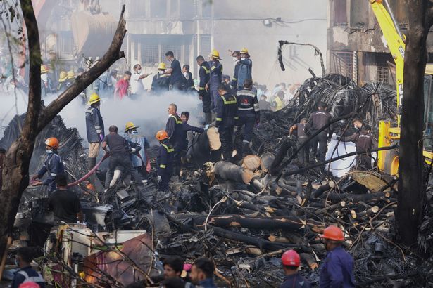 Search and rescue teams respond to the scene of the plane crash in Ahmedabad
