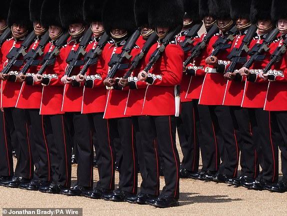 Members of the Coldstream Guards during the Trooping the Colour ceremony at Horse Guards Parade, central London, in celebration of King Charles III's official birthday. Picture date: Saturday June 14, 2025. PA Photo. See PA story ROYAL Trooping. Photo credit should read: Jonathan Brady/PA Wire