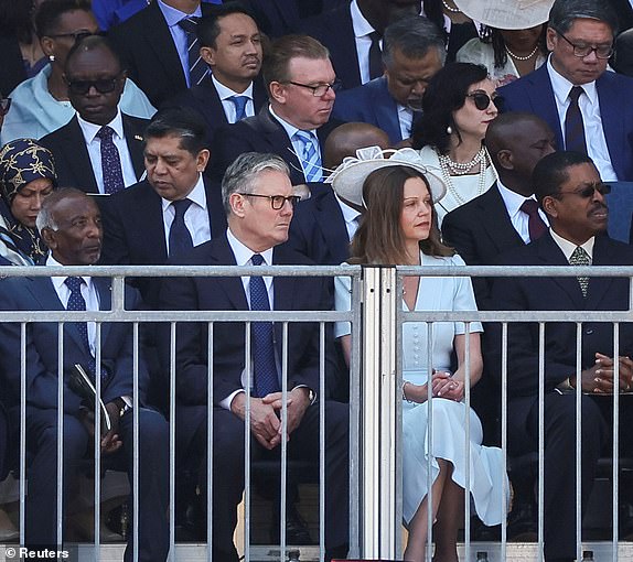 Britain's Prime Minister Keir Starmer and his wife Victoria Starmer attend the Trooping the Colour parade which honours King Charles on his official birthday, in London, Britain, June 14, 2025. REUTERS/Isabel Infantes