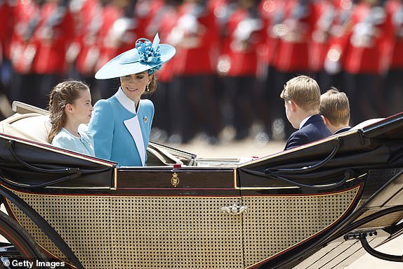 LONDON, ENGLAND - JUNE 14: Princess Charlotte of Wales, Catherine, Princess of Wales, Prince George of Wales and Prince Louis of Wales at Horse Guards Parade during Trooping The Colour 2025 on June 14, 2025 in London, England. Trooping The Colour is a ceremonial parade celebrating the official birthday of the British Monarch. The event features over 1,400 soldiers and officers, accompanied by 200 horses. More than 400 musicians from ten different bands and Corps of Drums march and while performing. (Photo by John Phillips/Getty Images)