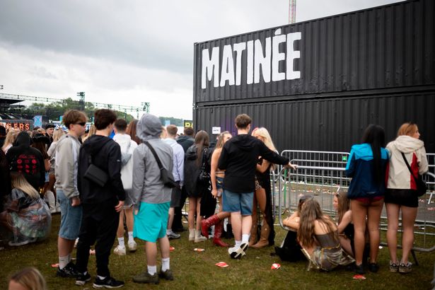 Festival-goers outside the Matinee stage after crowds were told to exit the area