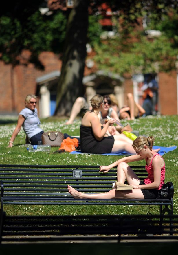 People enjoying warm weather in Birmingham