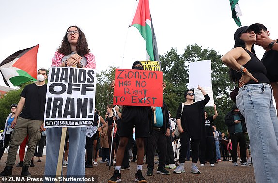Mandatory Credit: Photo by Gent Shkullaku/ZUMA Press Wire/Shutterstock (15364250d) Demonstrators hold signs as they protest the Israeli strikes on Iran and any potential US involvement in the conflict during a ''No War on Iran'' demonstration outside the White House in Washington, DC, on June 18, 2025. US President Donald Trump said on June 18 that he was still deciding whether to join Israel's strikes on Iran, claiming Tehran now wants talks at the White House but may have waited too long. No War On Iran Demonstration Outside The White House In Washingtonin, District Of Columbia, USA, Washington Dc, Virginia. - 18 Jun 2025