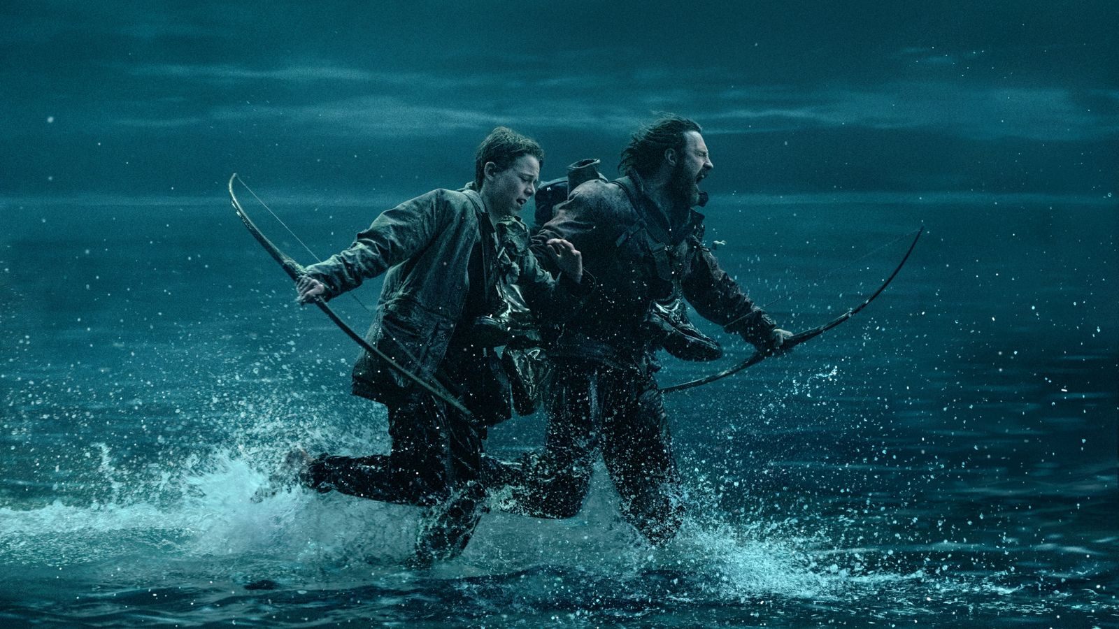 Alfie Williams and Aaron Taylor-Johnson being chased on the causeway. Pic: Sony Pictures Entertainment