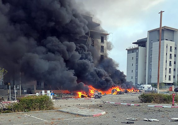 Mandatory Credit: Photo by Magen David Adom/UPI/Shutterstock (15368144a) A fire erupts after a missile fired from Iran struck southern Israel on Saturday, June 21, 2025. A spokesperson for Magen David Adom said a drone hit a two-story residential building in northern Israel. Exchange of Missile Strikes Between Israel And Iran, Tel Aviv - 21 Jun 2025