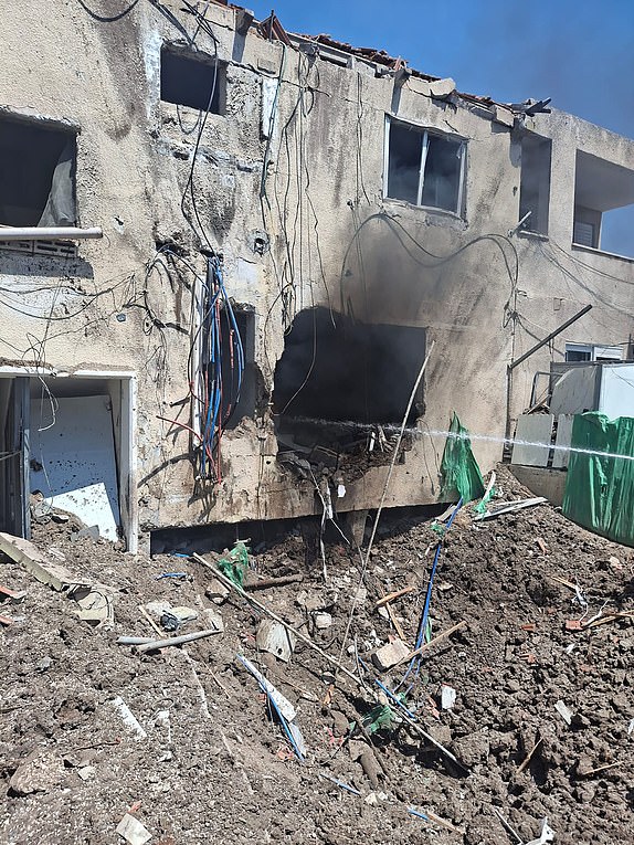 Mandatory Credit: Photo by Magen David Adom/UPI/Shutterstock (15368143a) A building was destroyed after a drone strike from from Iran hit southern Israel on Saturday, June 21, 2025. Israel and Iran have exchanged more strikes as the conflict enters its second week. P Exchange of Missile Strikes Between Israel And Iran, Tel Aviv - 21 Jun 2025