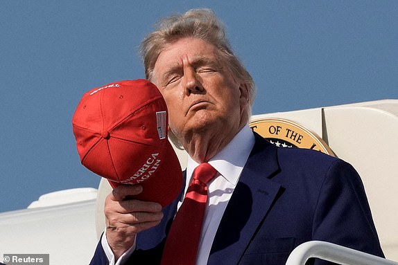 U.S. President Donald Trump disembarks Air Force One as he arrives at Joint Base Andrews, Maryland, U.S., June 21, 2025. REUTERS/Ken Cedeno     TPX IMAGES OF THE DAY