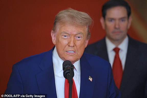 TOPSHOT - US President Donald Trump addresses the nation, alongside US Secretary of State Marco Rubio (R) from the White House in Washington, DC on June 21, 2025, following the announcement that the US bombed nuclear sites in Iran. President Donald Trump said June 21, 2025 the US military has carried out a "very successful attack" on three Iranian nuclear sites, including the underground uranium enrichment facility at Fordo. "We have completed our very successful attack on the three Nuclear sites in Iran, including Fordow, Natanz, and Esfahan," Trump said in a post on his Truth Social platform. (Photo by Carlos Barria / POOL / AFP) (Photo by CARLOS BARRIA/POOL/AFP via Getty Images)