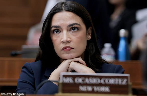 WASHINGTON, DC - MAY 13: Rep. Alexandria Ocasio-Cortez (D-NY) listens during a mark up meeting with the House Committee on Energy and Commerce committee on Capitol Hill on May 13, 2025 in Washington, DC. The committee met to discuss legislative recommendations for budget reconciliation. The committee room was surrounded by protesters fearing cuts or increased costs to medicaid. (Photo by Anna Moneymaker/Getty Images)