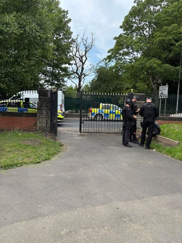 Armed police seen at Agecroft Cemetery moments after the Kersal incident