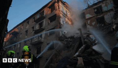 Rescuers from Ukraine's emergencies service DSNS tackle fire in a residential building destroyed in a Russian missile and drone attack on Kyiv. Photo: 23 June 2025