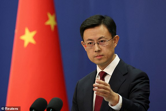 FILE PHOTO: Chinese Foreign Ministry spokesperson Guo Jiakun takes a question from a journalist at a press conference in Beijing, China January 7, 2025. REUTERS/Florence Lo/File Photo