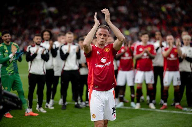Jonny Evans applauds the fans at the end of the Premier League match between Manchester United FC and Aston Villa FC at Old Trafford. 