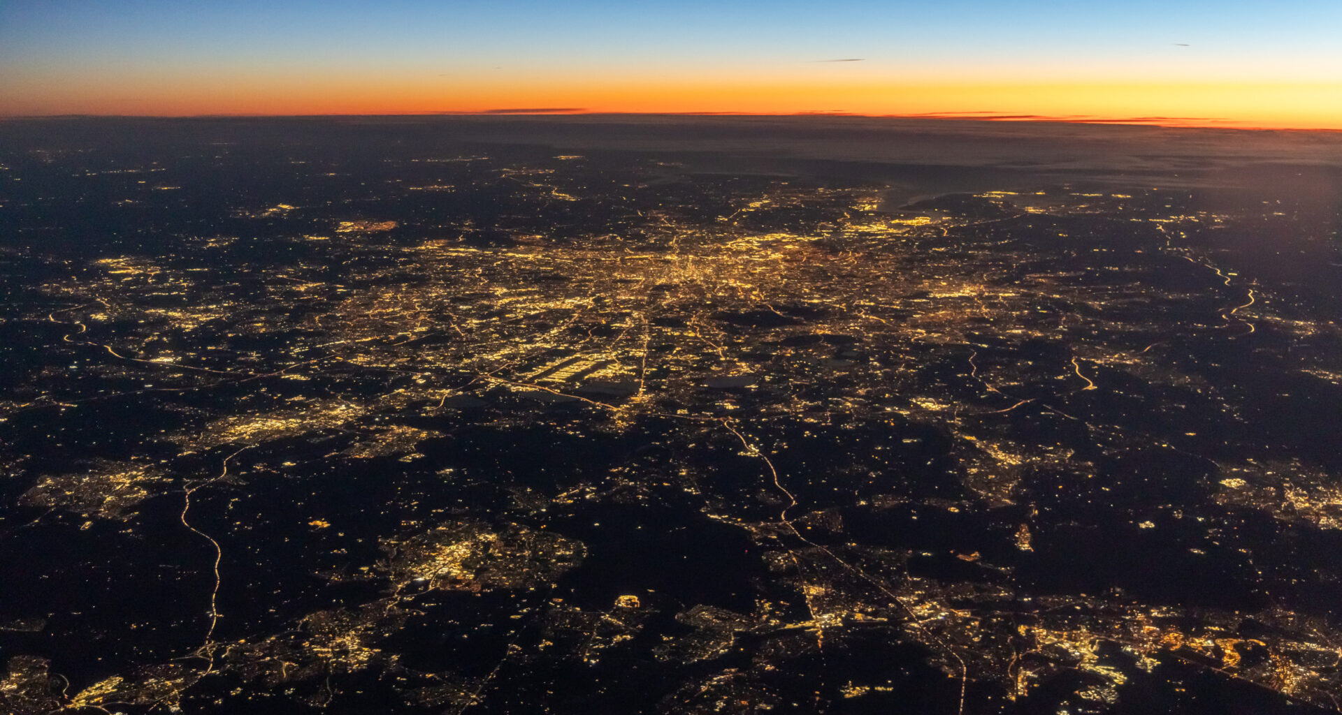 View of London from plane at dawn.