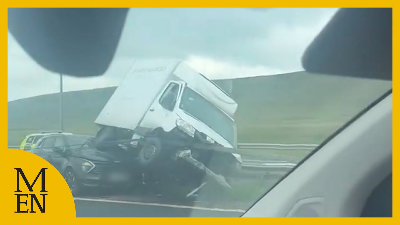 Horror smash on M62 as van crashes on top of car and central reservation
