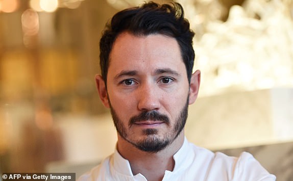 14846691 French pastry god Cédric Grolet tapped to create 'one of the most expensive wedding cakes ever' for Jeff Bezos and Lauren Sanchez's $20M Venice nuptials Le Meurice's pastry chef Cedric Grolet poses during a photo session at the luxury five-star Le Meurice Hotel in Paris on October 25, 2017. Grolet was named as the 2017 Best Restaurant Pastry Chef by the Grandes Tables du Monde Association on October 17, 2017 in New York.     / AFP PHOTO / STEPHANE DE SAKUTIN        (Photo credit should read STEPHANE DE SAKUTIN/AFP via Getty Images)