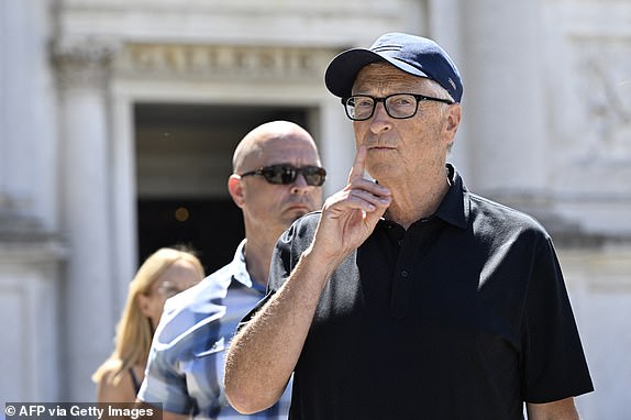 14854193  US tech entrepreneur Bill Gates leaves after a visit at the Gallerie dell'Accademia di Venezia, ahead of US Amazon founder Jeff Bezos' wedding with Lauren Sanchez, on June 27, 2025.  (Photo by ANDREA PATTARO / AFP) (Photo by ANDREA PATTARO/AFP via Getty Images)