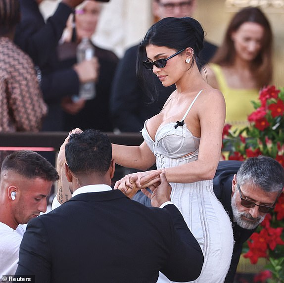 Kylie Jenner leaves Gritti Palace, on the second day of the wedding festivities of Amazon founder Jeff Bezos and journalist Lauren Sanchez, in Venice, Italy, June 27, 2025. REUTERS/Yara Nardi