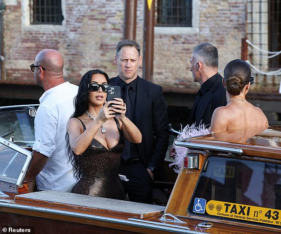 Kim Kardashian leaves Gritti Palace, on the second day of the wedding festivities of Amazon founder Jeff Bezos and journalist Lauren Sanchez, in Venice, Italy, June 27, 2025. REUTERS/Guglielmo Mangiapane