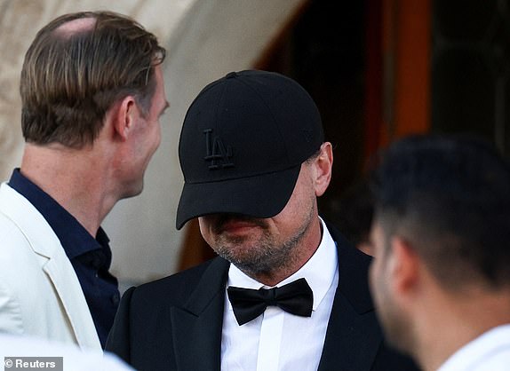 Leonardo DiCaprio leaves Gritti Palace, on the second day of the wedding festivities of Amazon founder Jeff Bezos and journalist Lauren Sanchez, in Venice, Italy, June 27, 2025. REUTERS/Guglielmo Mangiapane