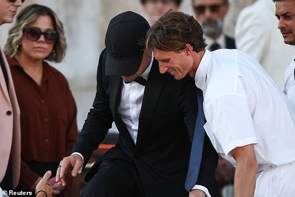 Leonardo DiCaprio leaves Gritti Palace, on the second day of the wedding festivities of Amazon founder Jeff Bezos and journalist Lauren Sanchez, in Venice, Italy, June 27, 2025. REUTERS/Guglielmo Mangiapane
