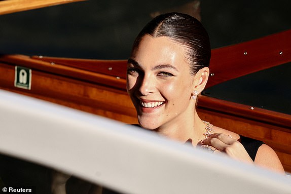Vittoria Ceretti leaves on a boat from the Gritti Palace, on the second day of the wedding festivities of Amazon founder Jeff Bezos and journalist Lauren Sanchez, in Venice, Italy, June 27, 2025. REUTERS/Yara Nardi