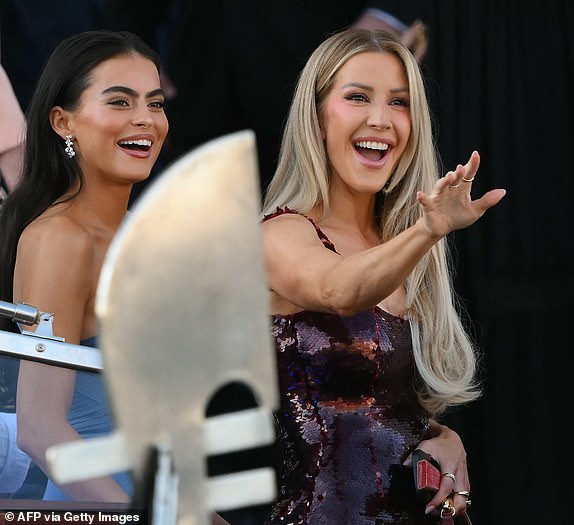 British singer and songwriter Ellie Goulding (R) leaves the Gritti Palace Hotel on the wedding day of Amazon founder Jeff Bezos with Lauren Sanchez, in Venice on June 27, 2025.  (Photo by Marco BERTORELLO / AFP) (Photo by MARCO BERTORELLO/AFP via Getty Images)