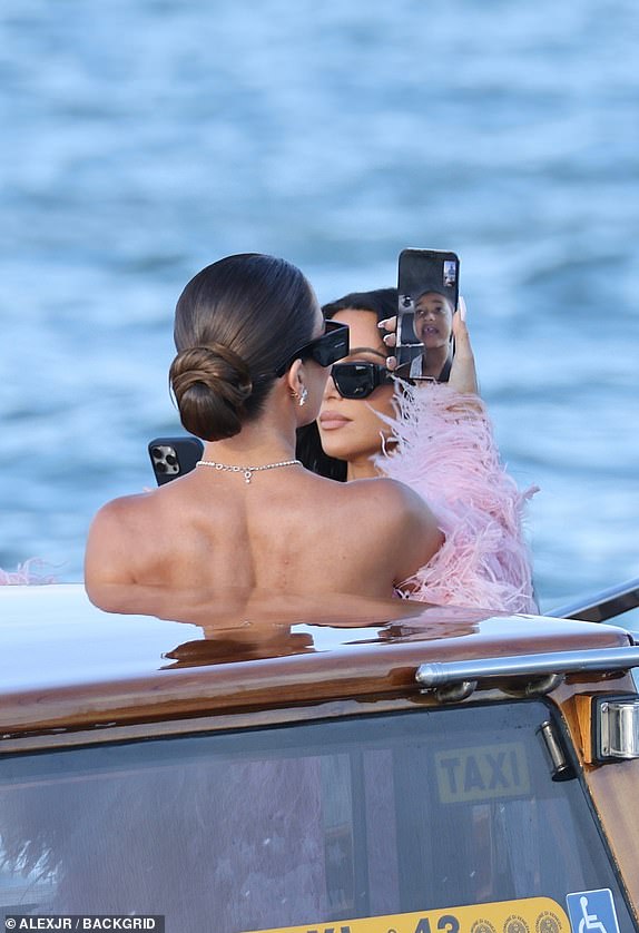Venice, ITALY  Kim and KhloÃ© Kardashian were the last to arrive at Jeff Bezos and Lauren Sanchez's wedding in Venice. The duo made a grand entrance, with the National Guard visible in the background as they approached the exclusive venu  Pictured: Kim Kardashian, Khloe Kardashian  BACKGRID USA 27 JUNE 2025   USA: +1 310 798 9111 / usasales@backgrid.com  UK: +44 208 344 2007 / uksales@backgrid.com  *UK Clients - Pictures Containing Children Please Pixelate Face Prior To Publication*