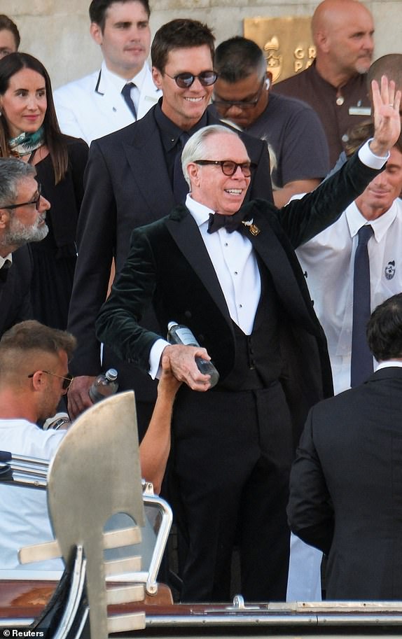 Fashion designer Tommy Hilfiger and Tom Brady leave Gritti Palace, on the second day of the wedding festivities of Amazon founder Jeff Bezos and journalist Lauren Sanchez, in Venice, Italy, June 27, 2025. REUTERS/Manuel Silvestri