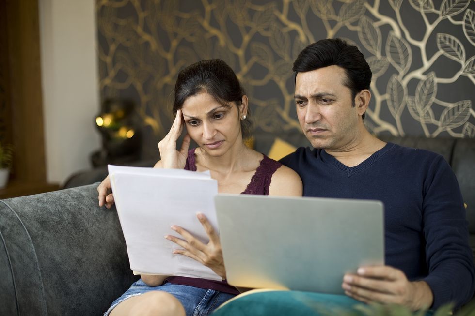 Couple confused at bills