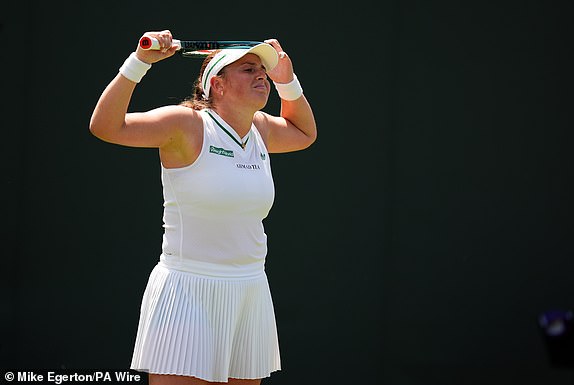 Jelena Ostapenko reacts during her match against Sonay Kartal on day one of the 2025 Wimbledon Championships at the All England Lawn Tennis and Croquet Club, London. Picture date: Monday June 30, 2025. PA Photo. Photo credit should read: Mike Egerton/PA Wire.RESTRICTIONS: Editorial use only. No commercial use without prior written consent of the AELTC. Still image use only - no moving images to emulate broadcast. No superimposing or removal of sponsor/ad logos.