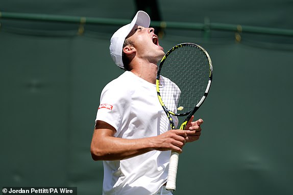 Oliver Tarvet reacts during his match against Leandro Riedi on day one of the 2025 Wimbledon Championships at the All England Lawn Tennis and Croquet Club, London. Picture date: Monday June 30, 2025. PA Photo. Photo credit should read: Jordan Pettitt/PA Wire.RESTRICTIONS: Editorial use only. No commercial use without prior written consent of the AELTC. Still image use only - no moving images to emulate broadcast. No superimposing or removal of sponsor/ad logos.