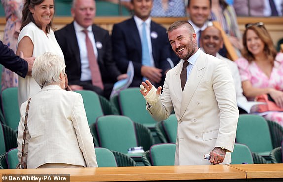 Sir David Beckham in the Royal Box with his mum Sandra on day one of the 2025 Wimbledon Championships at the All England Lawn Tennis and Croquet Club, London. Picture date: Monday June 30, 2025. PA Photo. Photo credit should read: Ben Whitley/PA Wire.RESTRICTIONS: Editorial use only. No commercial use without prior written consent of the AELTC. Still image use only - no moving images to emulate broadcast. No superimposing or removal of sponsor/ad logos.